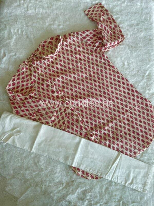 Off white, buti printed soft cotton Kurta with Mandarin collar with side button opening, full sleeves but foldable, paired with white pajama with drawstring