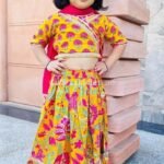Red and golden yellow Lehenga Choli with Dupatta
