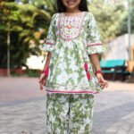 Green and white embroidered Kurti with Salwar set