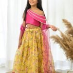 Yellow Organza lehenga with Pink Offshoulder Choli